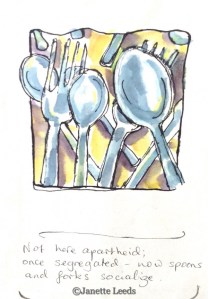 Forks and spoons laying together