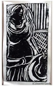 Linocut print of a pregnant woman